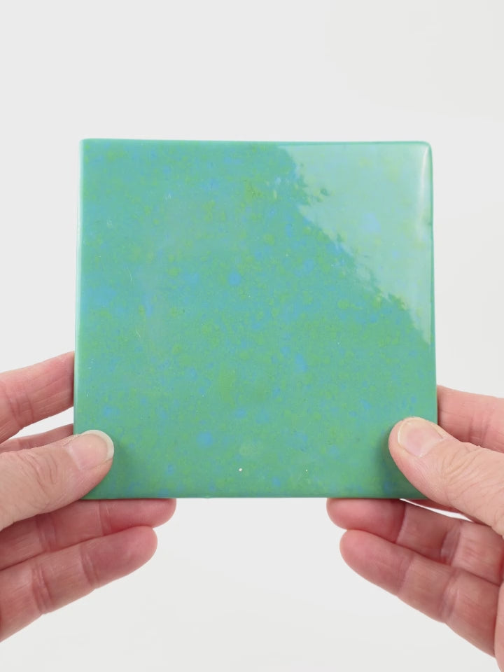 Video showing Morasutti Smalti mosaic tile – green_blue – 11.5 x 11.5 cm, rotated to show full tile